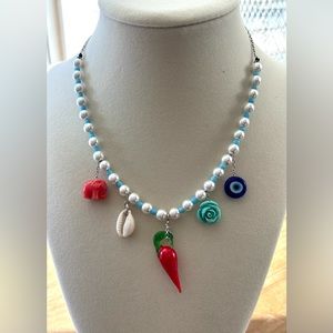 A handmade piece. Multi pendant necklace for women or teenagers.